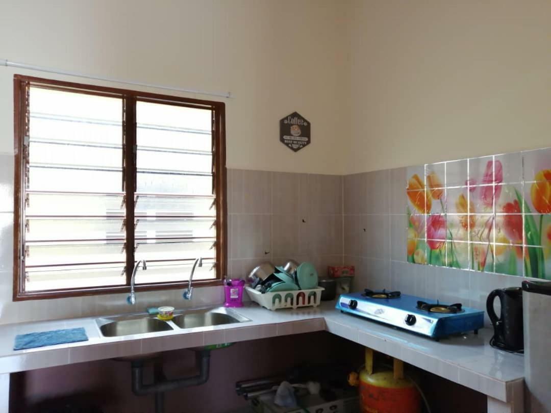 Homestay Ibu Pekan Buitenkant foto